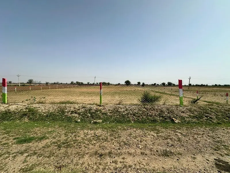 Farm plot with approach track in the AgriZameen focus belt